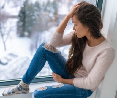 Winter,Depressed,Sad,Girl,Lonely,By,Home,Window,Looking,At