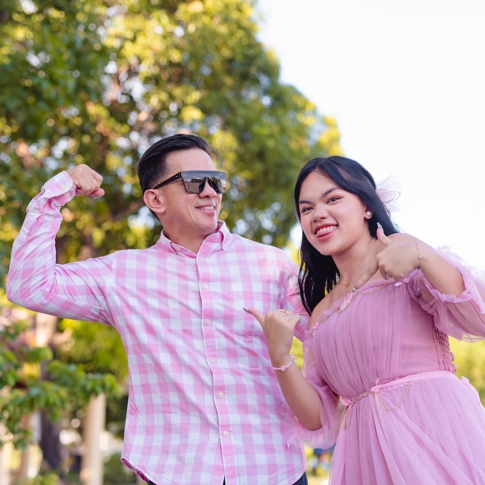 A,Handsome,Youthful,Asian,Man,Flexing,His,Arm,While,His